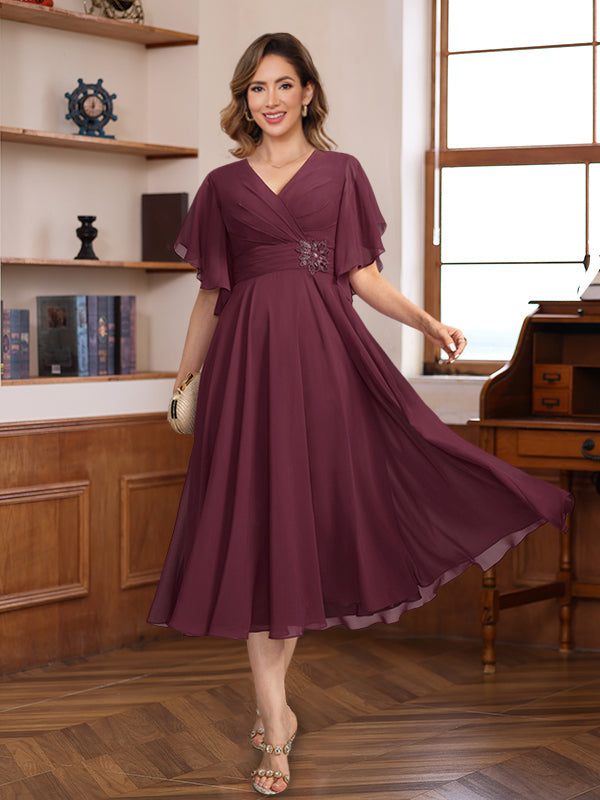 A-Line/Princess V-Neck Ruched Tea-Length Pleated Mother Of The Bride & Groom Dresses With Jewel Appliques & Ruffles BabaMila